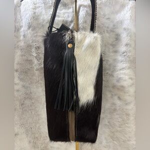 Myra NWT Cowhide Black Cosmetic Toiletry bag with Tassel Zipper Pull. Live 40